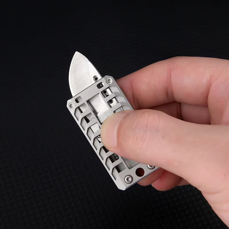The Titanium Alloy Push Knife with a Popping Sound Is a Portable Unboxing and Decompression Knife for Outdoor Camping